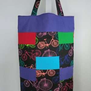 Image of cycling tote bag hanging on hook