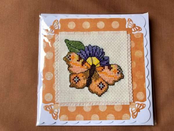 Cross stitched butterfly on white card