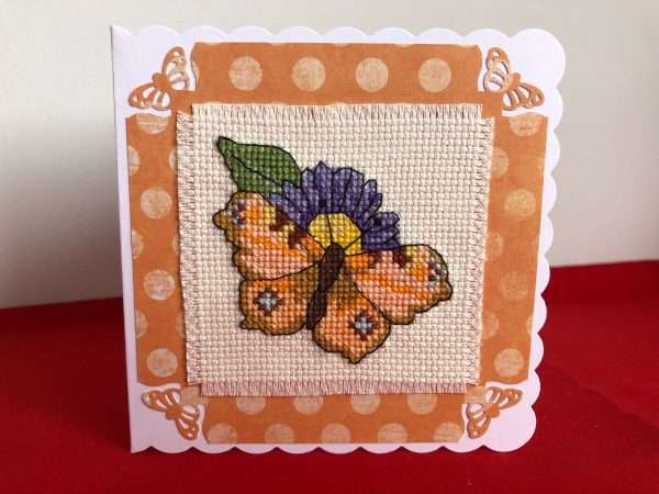 image of cross stitched butterfly on a white card