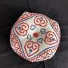 Biscornu Pincushion with red/blue pattern of heart shapes