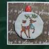 Card with reindeer ornament