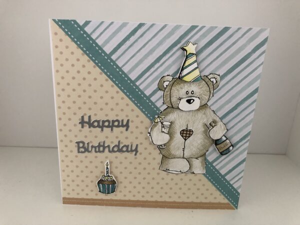 birthday card with bear holding champagne and glass