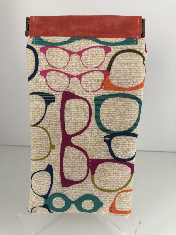 glasses case with glasses on the fabric