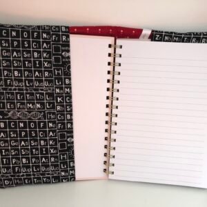 inside notebook cover showing front flap and spiral bound notebook