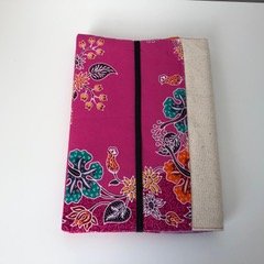 Notebook back showing elastic closing strap