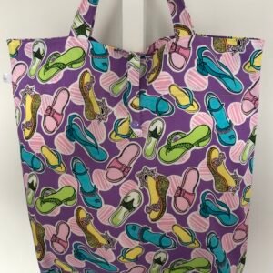 Back of shoe themed foldable bag showing folding strap
