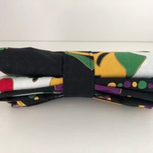 Foldable bag with a Mardi Gras design in a folded state
