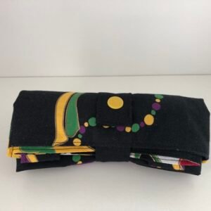 folded Mardi Gras bag with yellow press stud