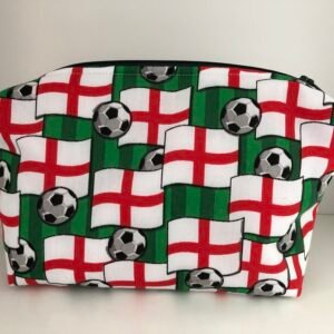 front of England football pouch with flags and footballs