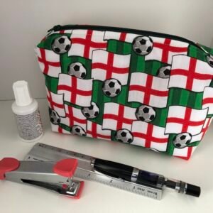 front of England football pouch showing a selection of stationery but this is not included.